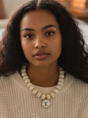 Louis Vuitton Cream Bead Necklace with Gold Accents and LV Medallion